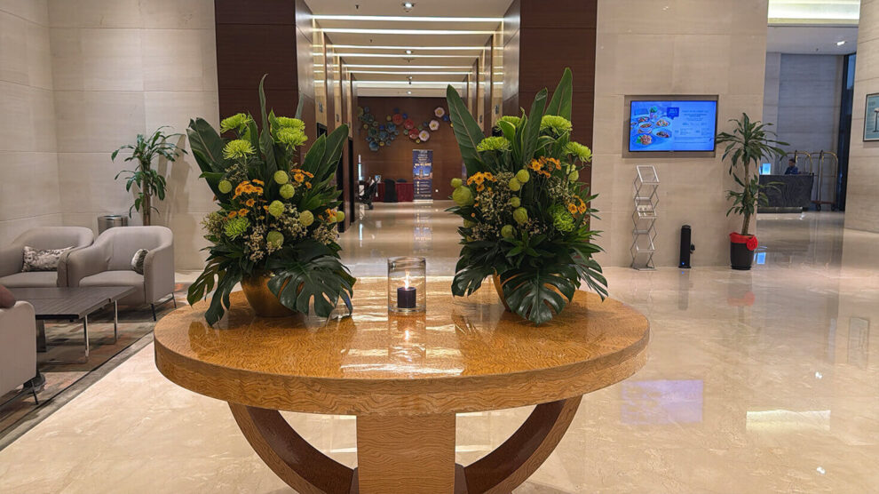 A bright, sparkling lobby welcomes guests into the hotel.