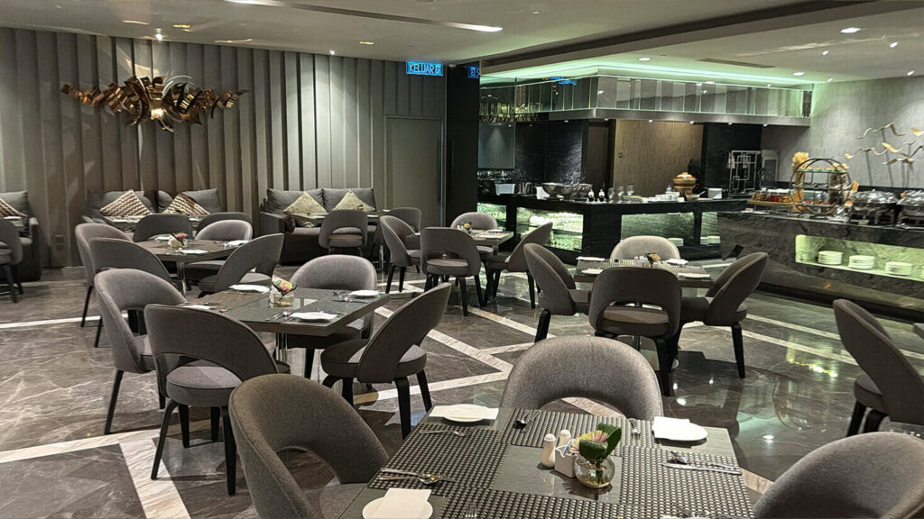 The Club Lounge combines dining tables, comfortable sofa seating and its own buffet area.